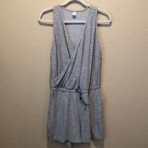 Women’s cross over romper. Cinch waist with pockets. EUC!